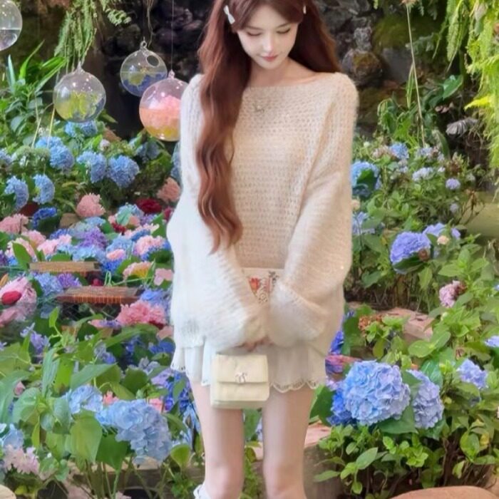 慵懒风露背蝴蝶结软糯毛衣女2025早秋新款设计感宽松内搭针织上衣