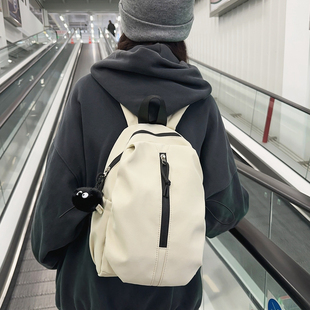 学生便简约双肩包女2024新款时尚登山包男休闲旅游户外小号背包