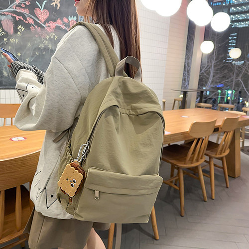 书包女生轻便百搭双肩包