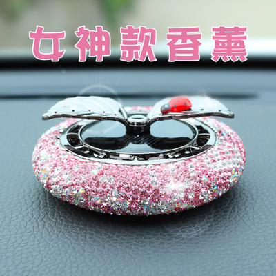 车载香水太阳能旋转香薰汽车内饰用品持久淡香镶钻香芬膏摆件