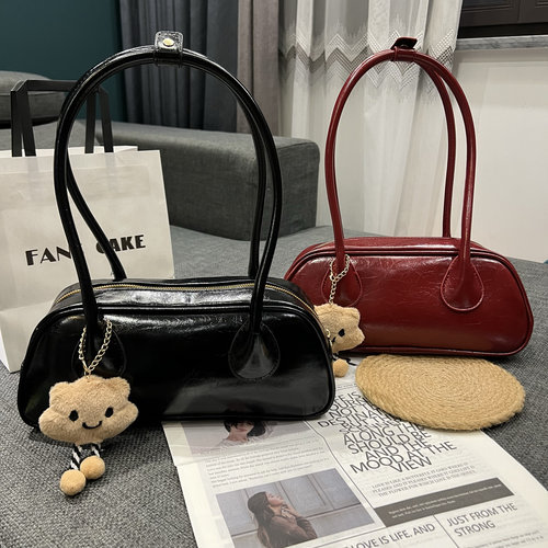 法式小众设计保龄球腋下包女2025新款高级感大容量手提单肩通勤包