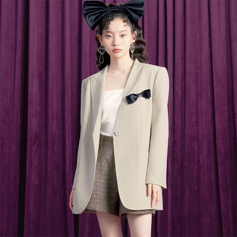 糖力设计感不对称衣领西装外套