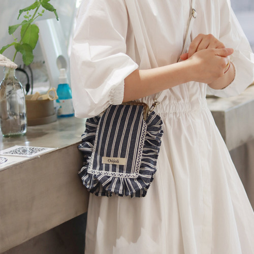 吾尤粒条纹小清新法式口金包