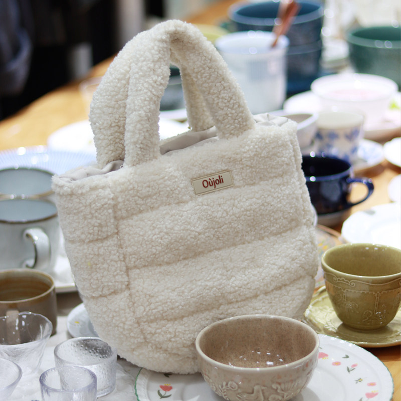 吾尤粒毛绒可爱手提包