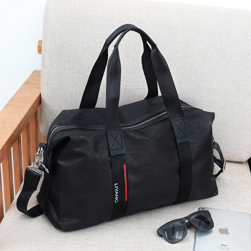 大容量旅行包男手提时尚轻便防水行李包商务出差包简约登机箱包潮