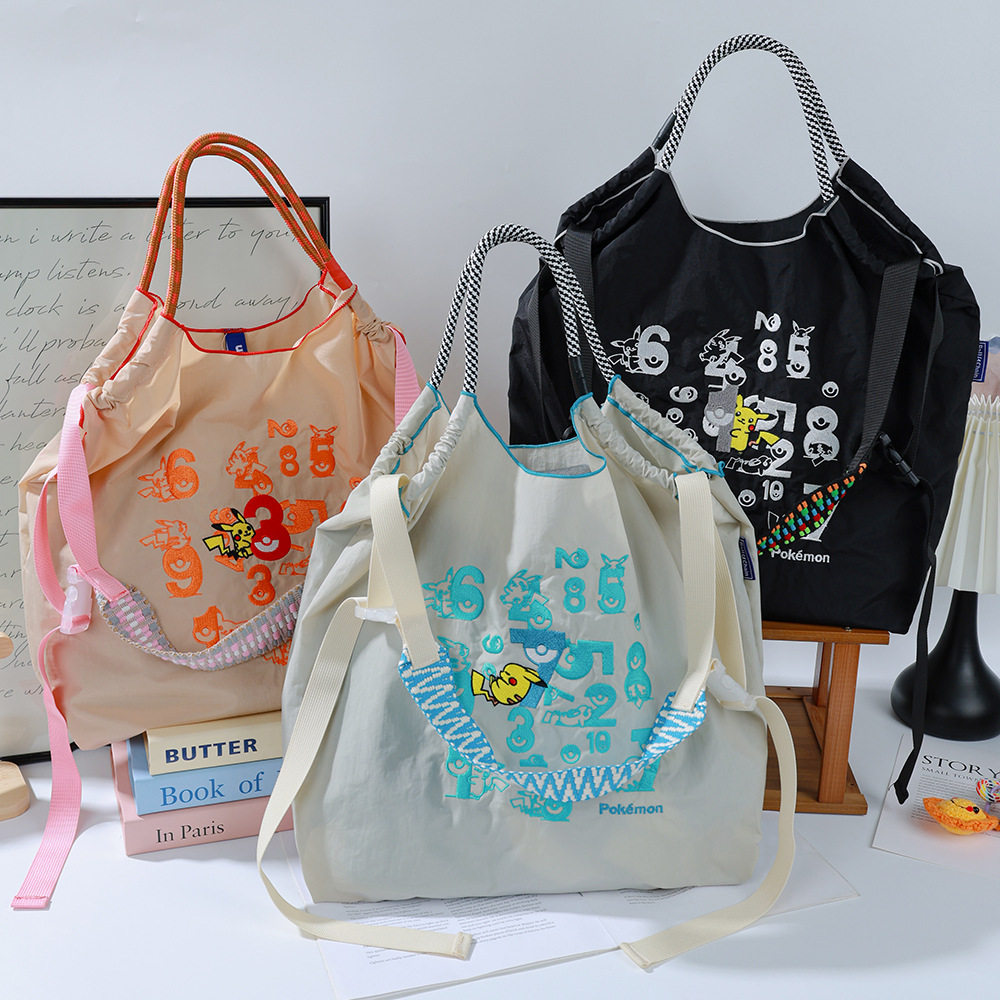 新品卡通万针刺绣尼龙防水环保袋百搭潮流通勤大容量可收纳单肩包