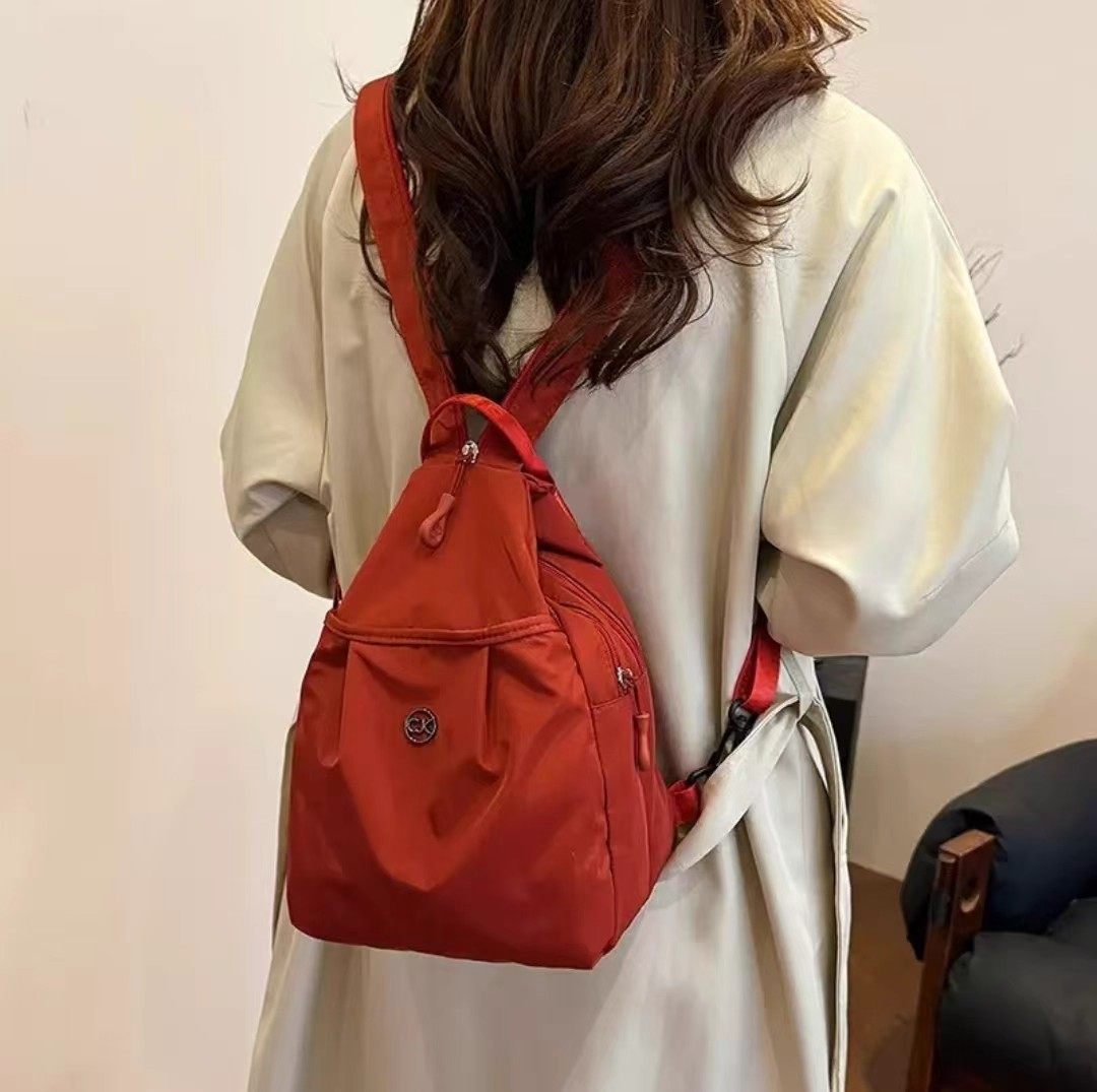 隽可精品多层时尚百搭女士胸包大容量牛津纺双肩包休闲斜挎旅行包