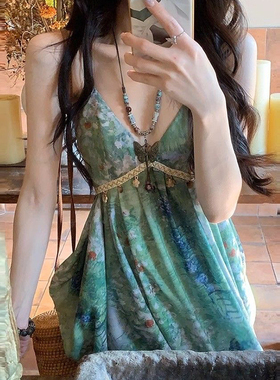 绿野仙踪森系连衣裙女夏绿色晕染碎花吊带裙云南泰国海边度假长裙