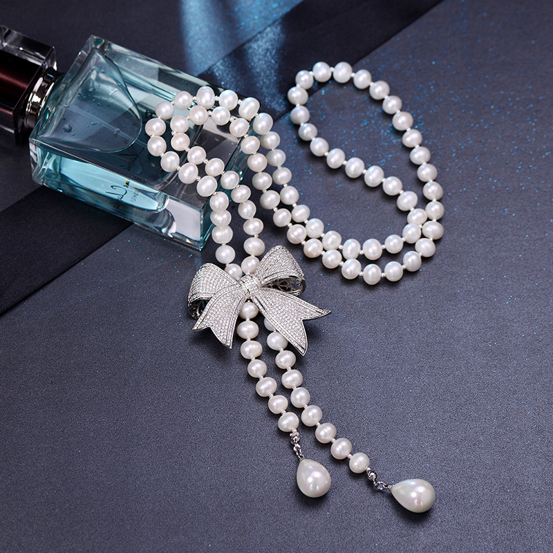 晶柜天然珍珠项链女蝴蝶结吊坠毛衣链长款百搭简约毛衣挂件配饰品