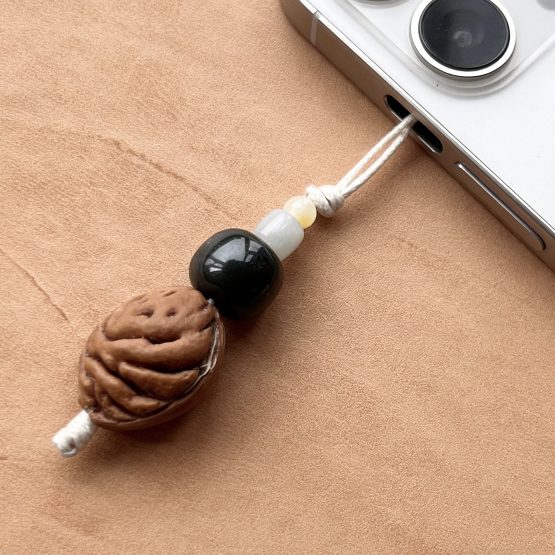 桃枭桃核佛塔天然和田玉蜜蜡手机链箱包挂件车挂护身吊坠防小人