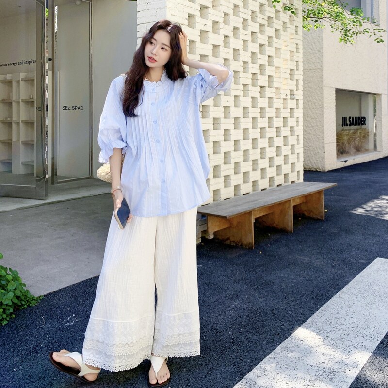 浅蓝色木耳边减龄衬衫套装女2025年夏季新款蕾丝拼接阔腿裤两件套图片