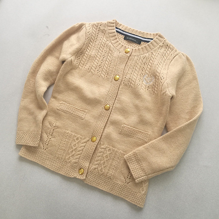 韩版单排扣米色泡泡袖羊毛针织衫