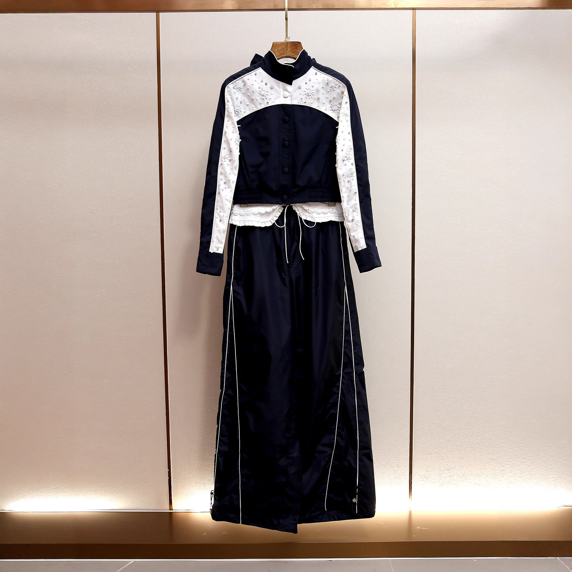 深圳南油高端女装秋季新款法式运动风钉珠风衣A字阔腿长裤套装女