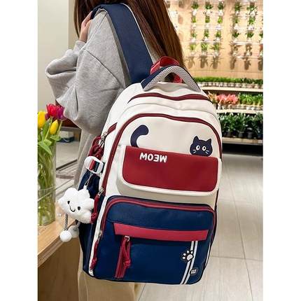 书包女生新款小学生三到六年级减负护脊超轻便大容量初中生双肩包