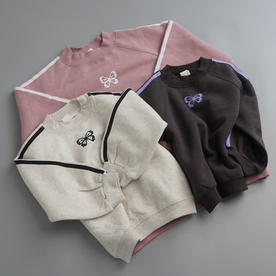 19126日系女童加绒保暖卫衣2025年新款蝴蝶结插肩袖圆领印花上衣