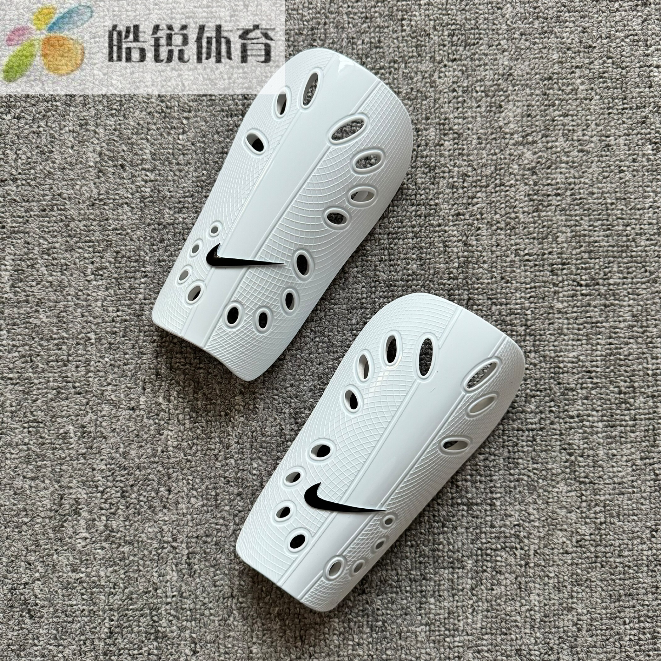 Nike耐克儿童足球训练比赛透气缓震柔软舒适插板护腿板SP0040 - 实物图