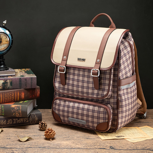 托米约翰小学生书包一二三到六年级护脊减负男孩女孩儿童背包防水