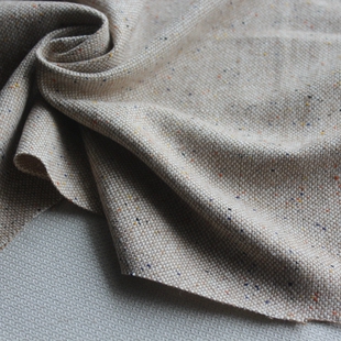 特价新品混纺羊毛布卡其色色织彩点中厚垂重服装面料140cm宽1米价