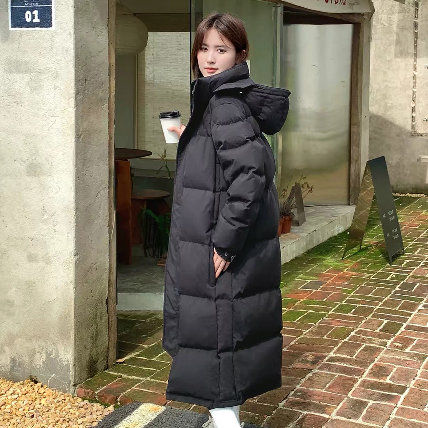 情侣款羽绒服女中长款过膝加厚冬季宽松大码黑色男女保暖中戏外套