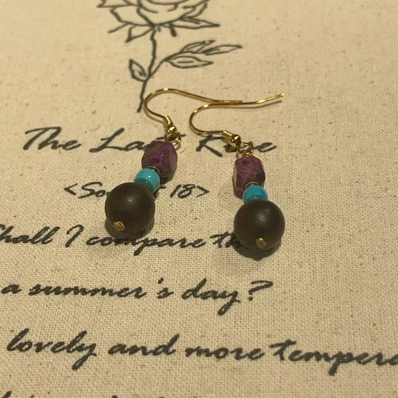 沉水白奇楠南非舒俱来桃红钻切耳