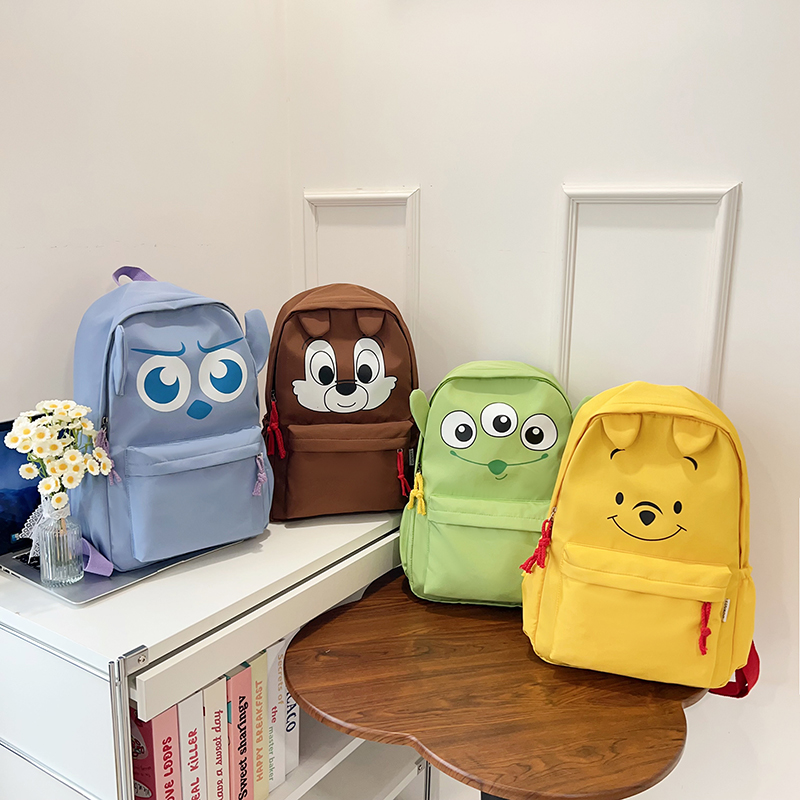 新款蓝毛怪日系三眼仔小熊维尼花栗鼠书包男童背包双肩小旅行包