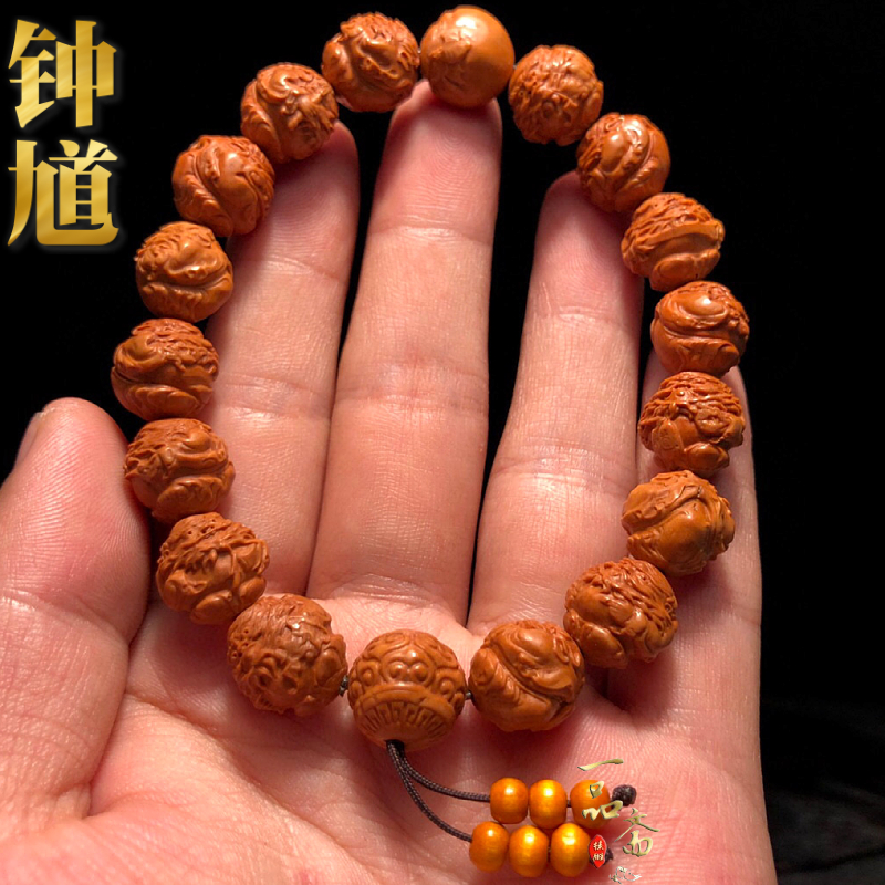 龙纹桃核雕刻钟馗手串