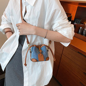 抽绳撞色水桶包2026新款 潮烧卖包高级感精致单肩斜挎包迷你小包包