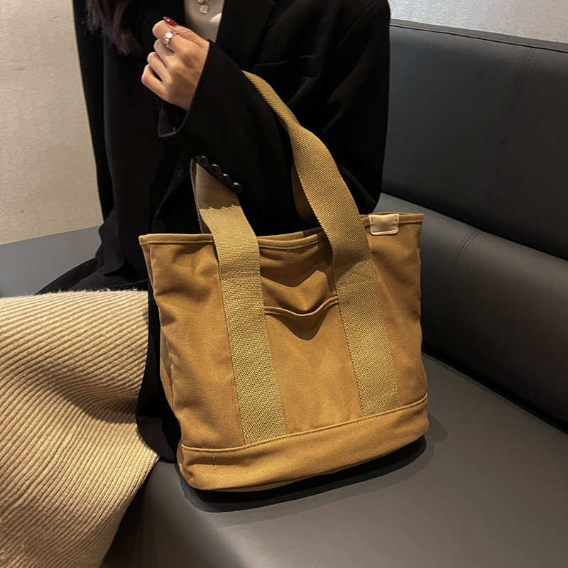 大容量单肩包女简约休闲托特包初中女生高中学生上课帆布包手提袋