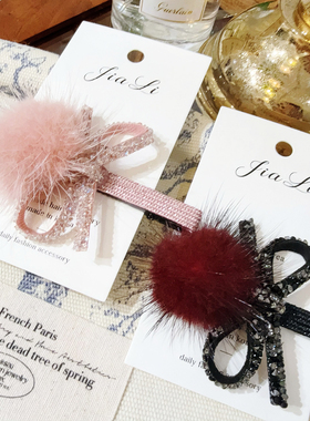 2025年秋冬韩国新款TAURUS貂毛绒气质砂糖蝴蝶结毛球小众鸭嘴夹