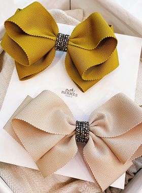 韩国TAURUS新款s水晶布艺施华子S立体螺纹带蝴蝶结发弹簧夹自动夹