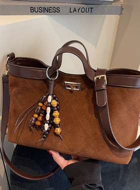 今年流行复古手提包女2026新款秋季百搭豹纹麂皮绒通勤单肩斜挎包