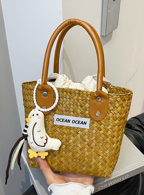 夏天超火编织手提菜篮包女2026新款百搭休闲沙滩度假包时尚草编包