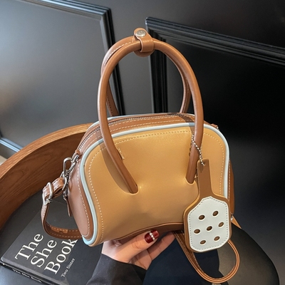 韩版小众时尚简约手拎通勤包包女2025春季新款高级感斜挎保龄球包