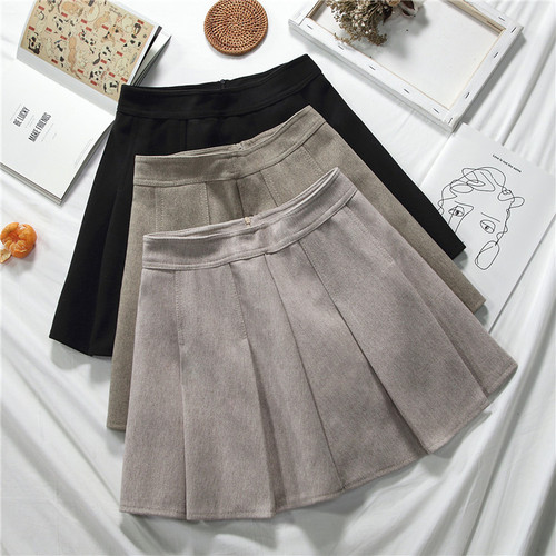 Actual shooting of the new autumn-winter Korean version of loose half-length skirt, pleated skirt, high waist A-shaped skirt and short skirt for students