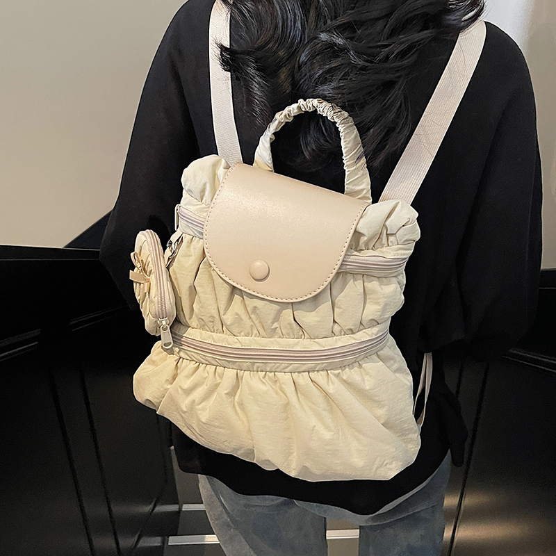 学院风褶皱双肩包女2025新款潮时尚简约后背包春季大容量帆布书包