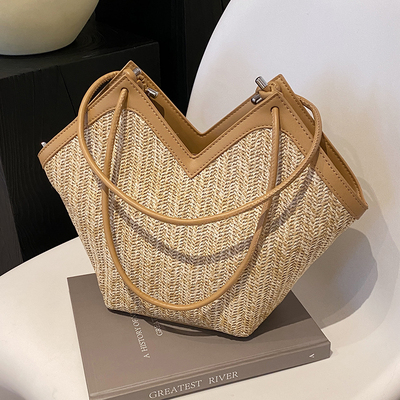 春夏小众草编包包女2025新款超火手提包托特水桶包百搭单肩腋下包