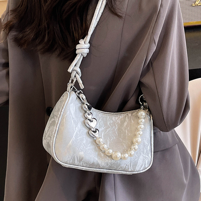 时尚大气珠子抽拉腋下包