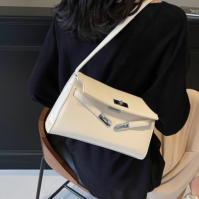 休闲简约单肩腋下凯莉包