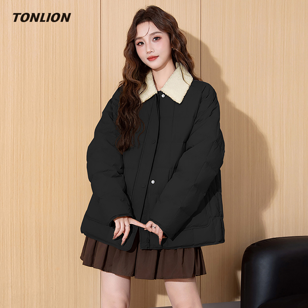 唐狮黑色短款羽绒服女2025冬季新款撞色翻领宽松设计感保暖厚外套
