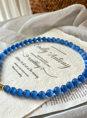 蓝色猫眼石项链打结爱心扣