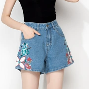 Phong cách Trung Quốc 2019 xuân mới của phụ nữ gió thêu quốc gia quần lớn chân quần jeans nữ quần short - Quần jean