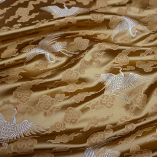 金棕黄色祥云朵仙鹤织锦缎布料丝绸缎子面料云锦唐装汉服装饰