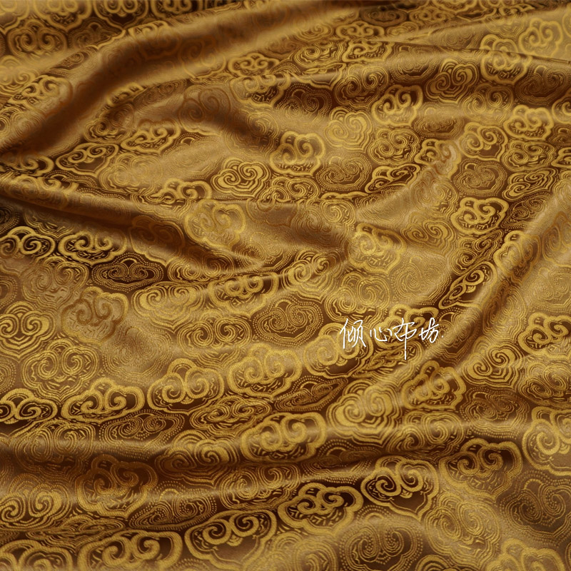 古铜色中式如意头祥云纹提花布料