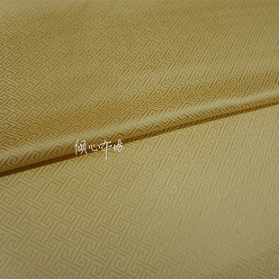 明亮浅黄色纯色小工字纹万字纹回纹织锦缎布料丝绸缎子面料中式