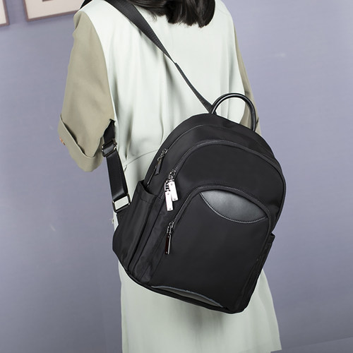 休闲双肩背包轻便牛津布搭配牛皮