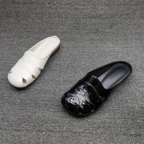 牛皮镂空平底穆勒鞋包头拖鞋女