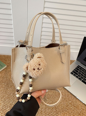 超火不撞款手提水桶包包女式2026新款轻奢小众高级感通勤斜挎小包