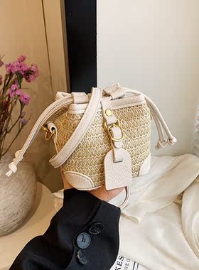 韩版小众设计迷你口红包包女2024新款草编水桶包潮斜挎包烧麦包