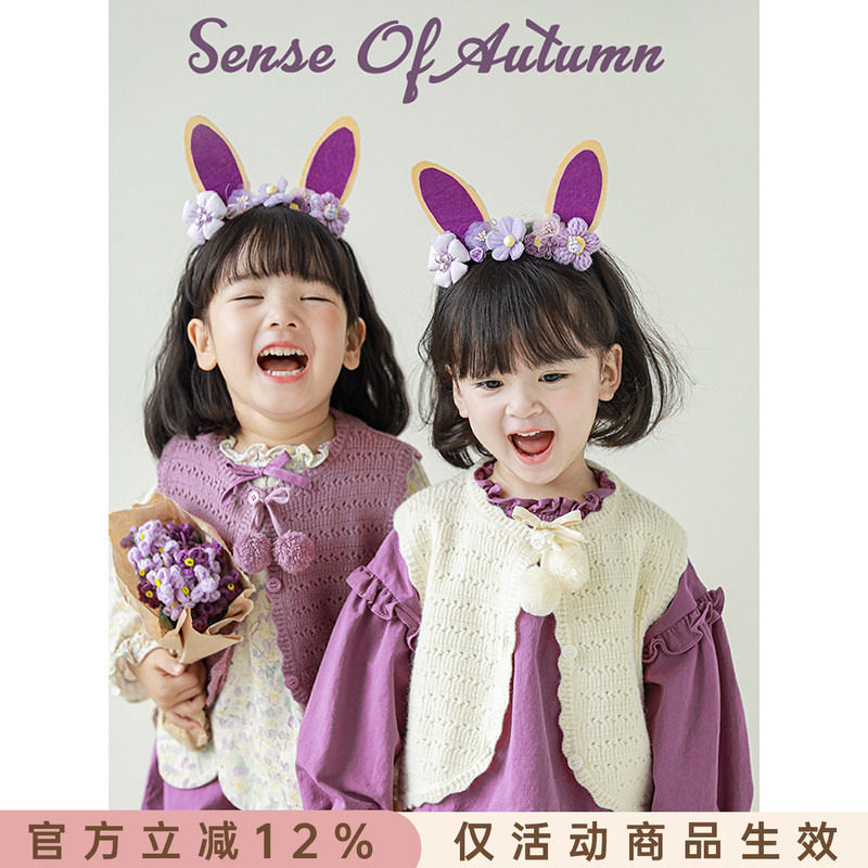 幼悠时尚毛球系带马甲图片