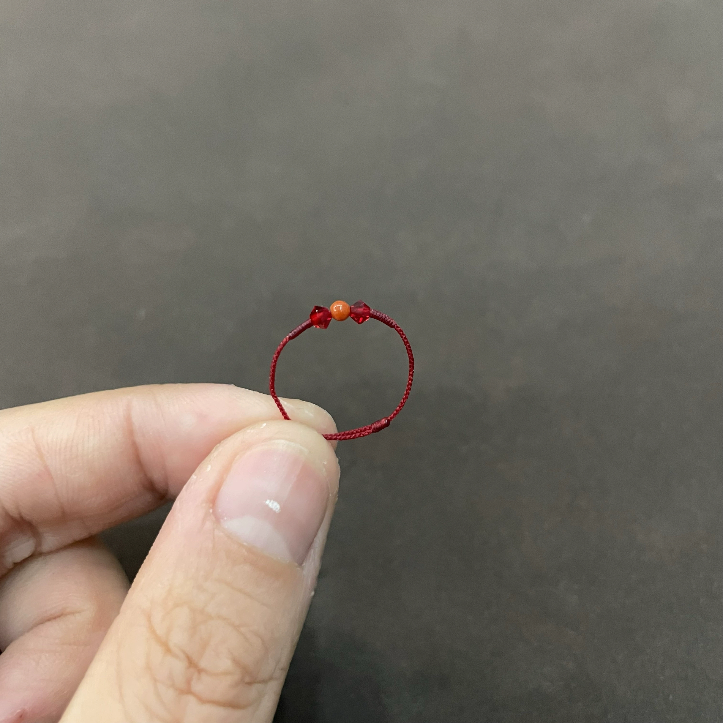 极细红水晶编织红绳尾戒
